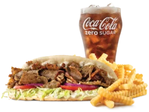 Arby's Greek Gyro Meal with seasoned meat, fresh veggies, and fries.