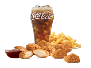Crispy, all-white meat chicken nuggets served with a side of fries and a drink.