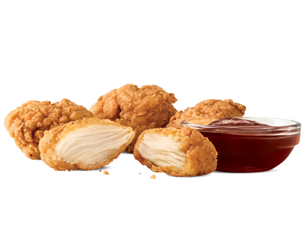 Premium 4PC Chicken Nuggets 1 4-piece premium chicken nuggets with dipping sauce